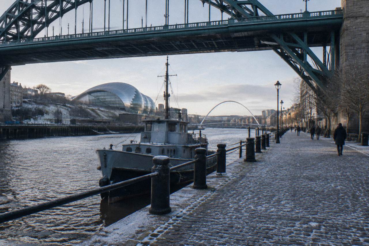 Free riverside walking route on the Newcastle and Gateshead Quayside beneath the Tyne Bridge